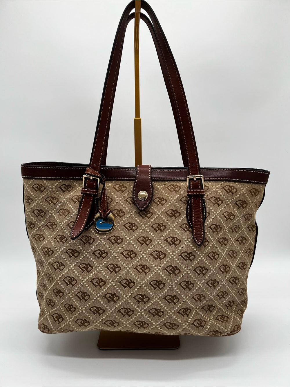 Dooney & Bourke Tan Monogram Canvas Tote with Brown Leather Trim